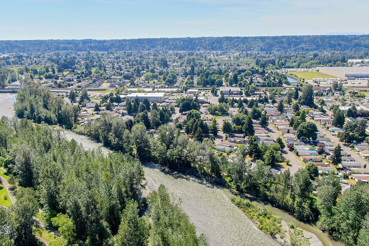 aerial photo of mobile home park with river nearby